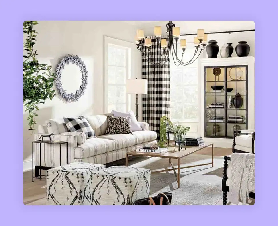 A chic traditional living room with a striped sofa and bold checkered curtains 