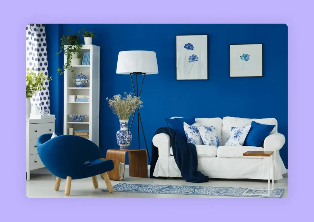A calming living room with deep blue walls showing the effects of the psychology of colors in interior design. 