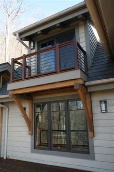 balcony overhang front porch decorating ideas