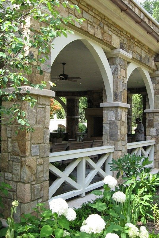 dramatic arch style front porch decorating ideas