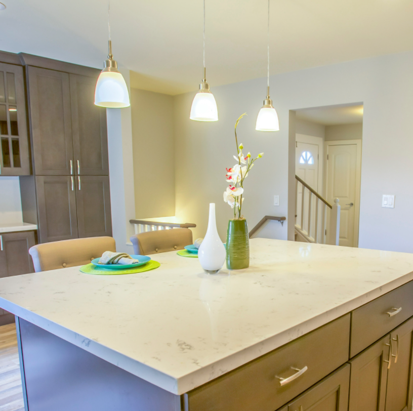 small kitchen island with pendant lights