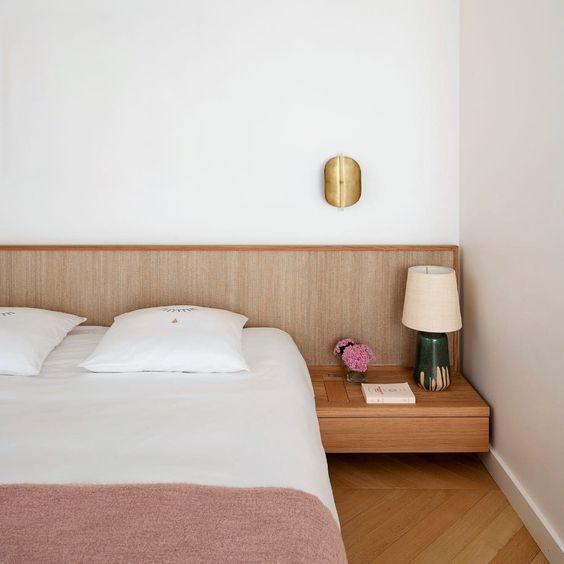 nightstands wrapped in headboard