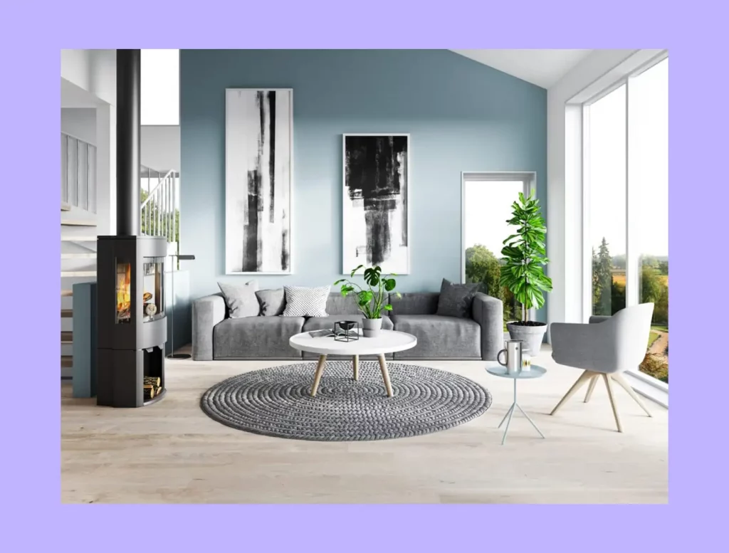 A living room design that uses a large fireplace as its main focal point.