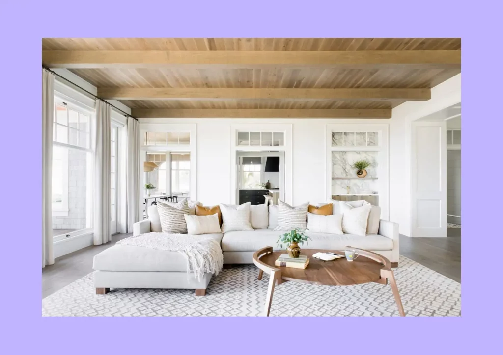 An airy living room with furniture arranged to showcase excellent space proportion. 