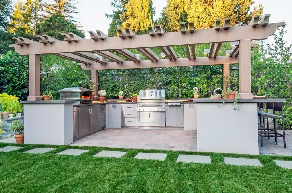 patio kitchen with a mini fridge and sink
