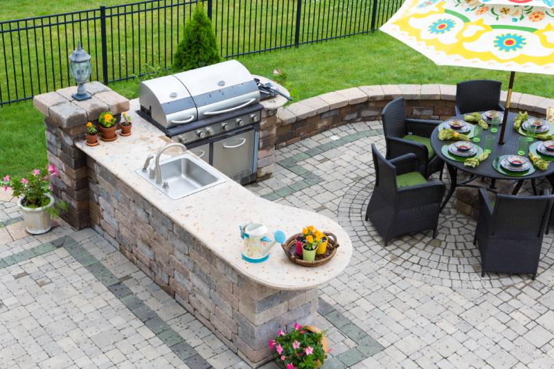 step down stone outdoor kitchen