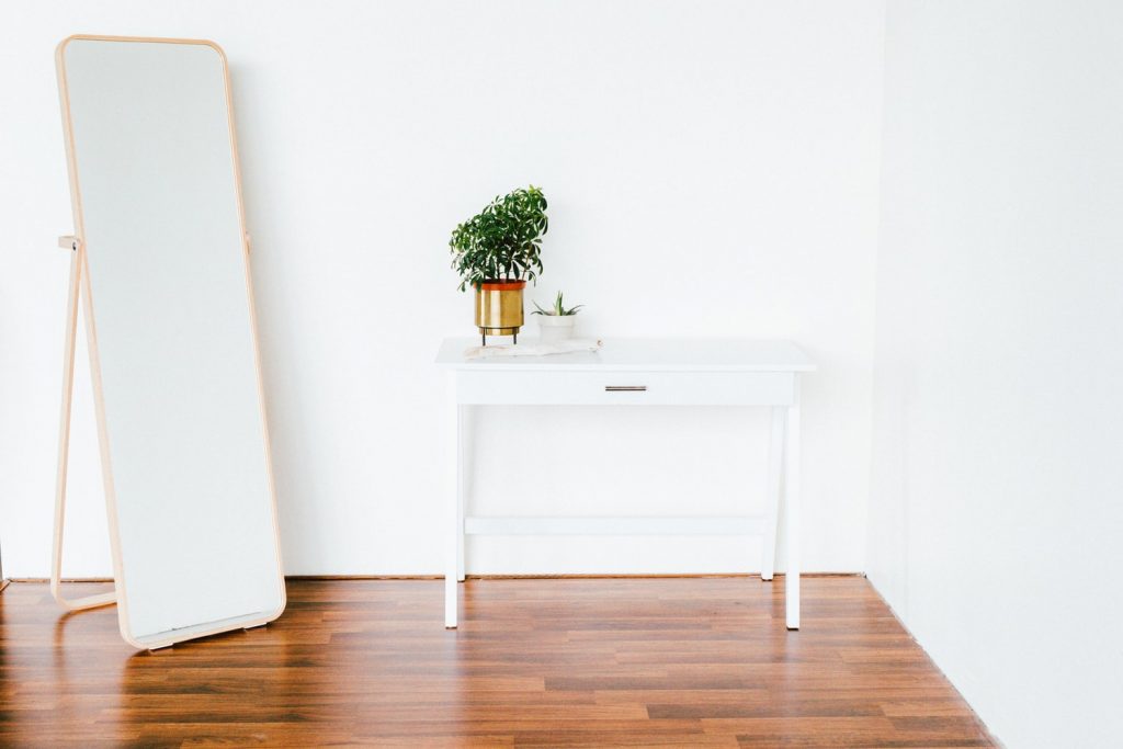 add mirror to increase natural light in home
