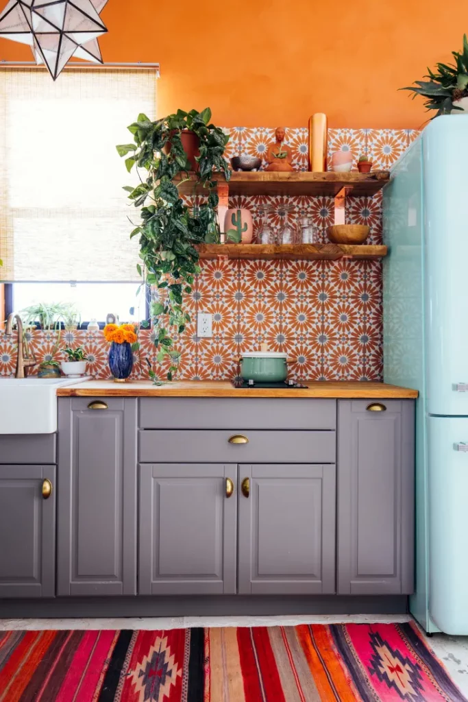 dark grey with orange - kitchen color schemes
