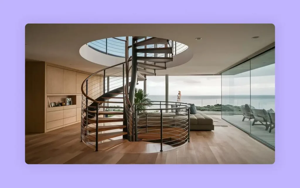 A modern wooden staircase in a spiral design in a home. 