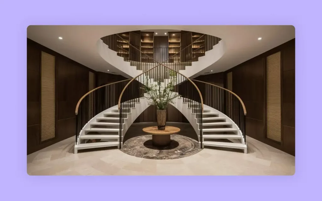 An elegant L-shaped staircase design with two curving white flights.